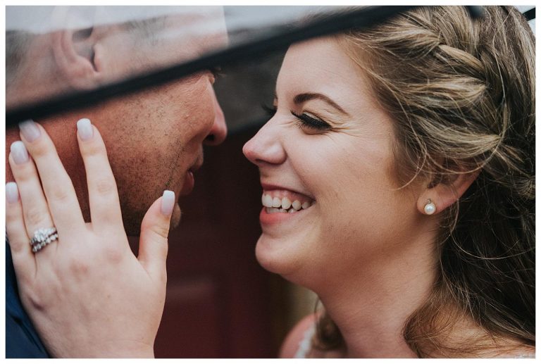 Kissing in the rain | Rainy wedding photo ideas | Hanover Wedding | The Special Events Centre