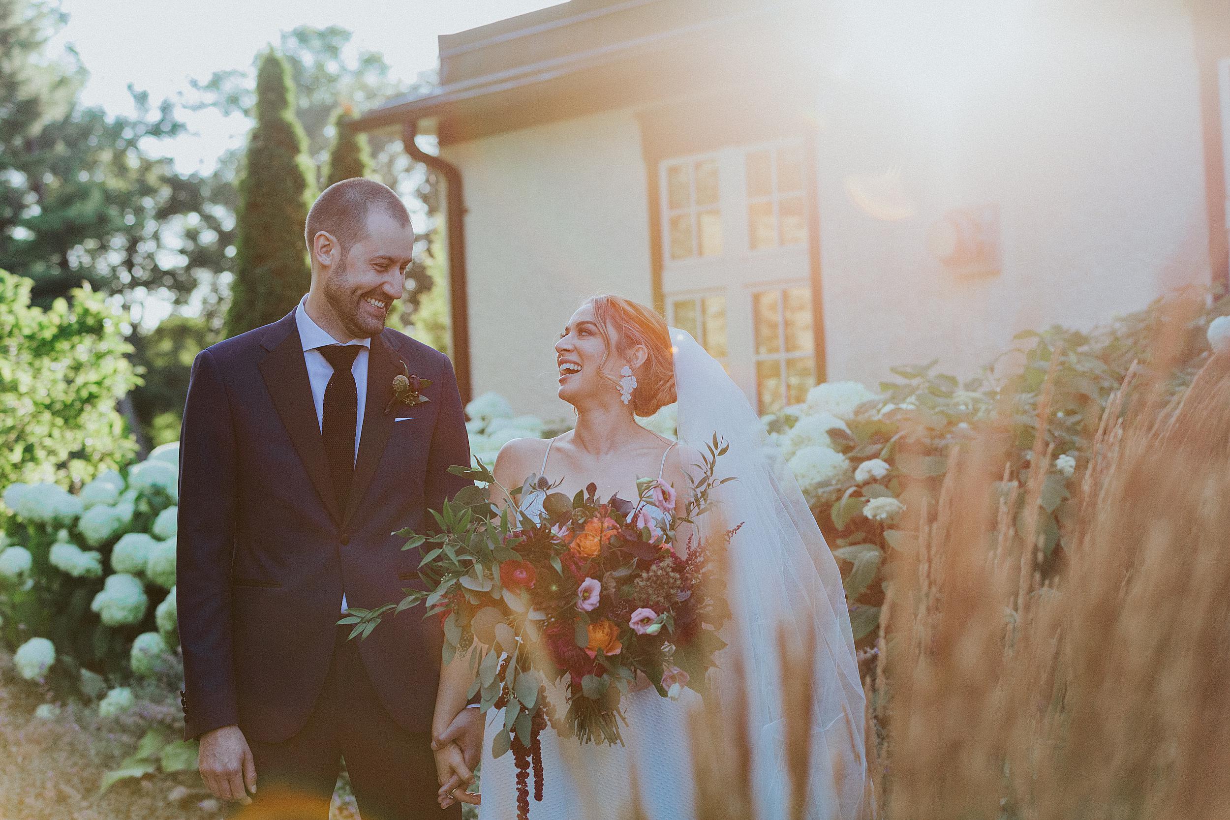 Bride and groom sharing a laugh at Kitchener Westmount Golf and Country Club